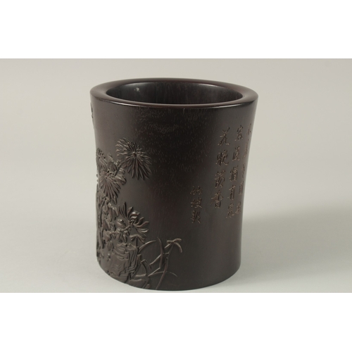 66 - A FINE AND LARGE 18TH-19TH CENTURY HARDWOOD BITONG BRUSH POT, with finely carved relief floral decor... 