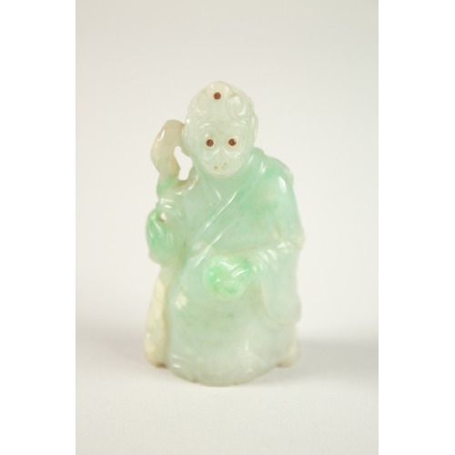 76 - A FINE CHINESE CARVED JADE MONKEY IMMORTAL, with inlaid eyes and headpiece, 6cm high.