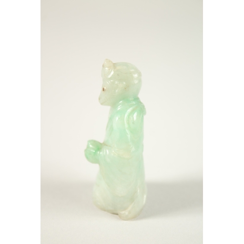 76 - A FINE CHINESE CARVED JADE MONKEY IMMORTAL, with inlaid eyes and headpiece, 6cm high.