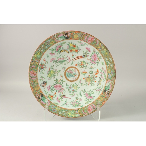 9 - A CHINESE CANTON FAMILLE ROSE PORCELAIN HANDLED BOWL AND DISH, the bowl possibly a chamber pot, 25cm... 