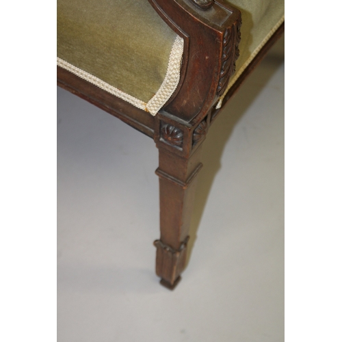 1028 - A GOOD MAHOGANY ELBOW CHAIR, early 20th Century, with floral carved cresting rail, upholstered back,... 