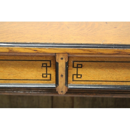 1033 - A GOOD VICTORIAN OAK AND EBONY INLAID OPEN BOOKCASE, with a pair of frieze drawers over two shelves,... 