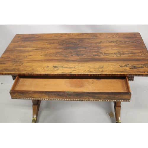 1037 - A GOOD ROSEWOOD RECTANGULAR SMALL LIBRARY TABLE, in the manner of George Bullock, with a single frie... 