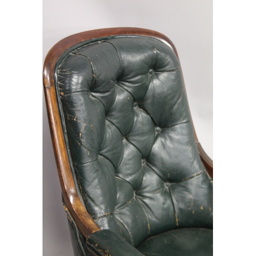 1039 - A WILLIAM IV MAHOGANY AND GREEN LEATHER BUTTON UPHOLSTERED LIBRARY ARMCHAIR, with turned and carved ... 