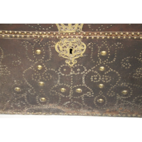 1040 - A GOOD 18TH CENTURY BRASS STUDDED LEATHER DOME TOP TRUNK, with wrought iron carrying handles, dated ... 