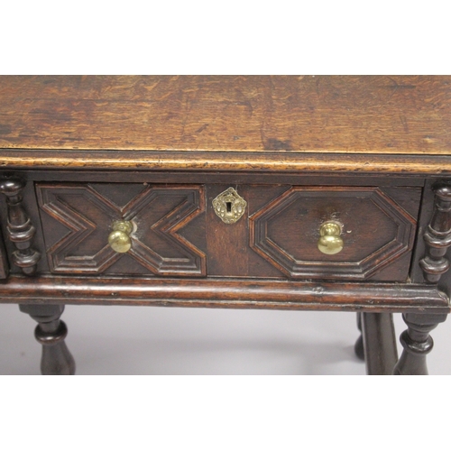 1050 - A 19TH CENTURY OAK DRESSER BASE OF SMALL SIZE, with a pair of moulded, panelled drawers on baluster ... 