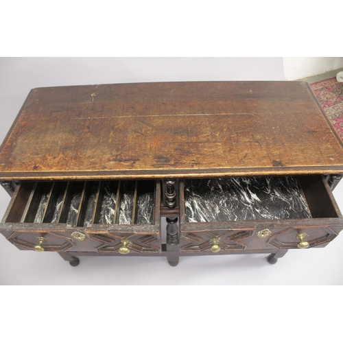 1050 - A 19TH CENTURY OAK DRESSER BASE OF SMALL SIZE, with a pair of moulded, panelled drawers on baluster ... 