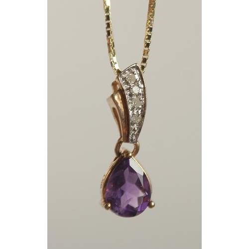 1663 - A 9CT YELLOW GOLD PEAR SHAPED AMETHYST PENDANT with diamond set bale on a gold-plated silver chain, ... 