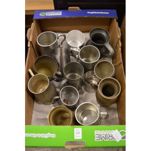 129 - Pewter tankards etc.