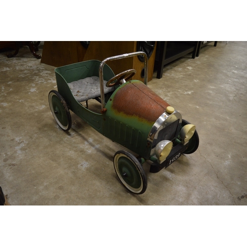 161 - A pedal car.