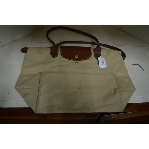 202 - A Longchamp folding bag.