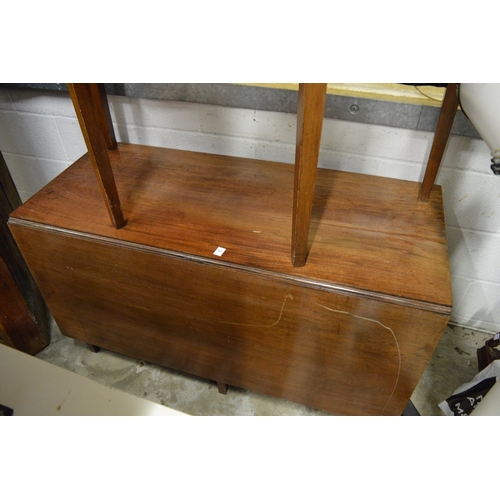 209 - A mahogany drop-leaf dining table with a pair of D shaped extensions.