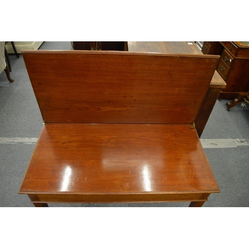 243 - A 19th century mahogany rectangular fold-over tea table.