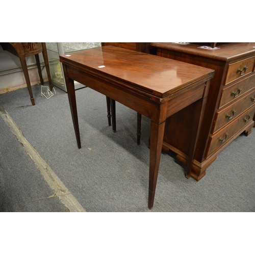 250 - A 19th century mahogany rectangular fold-over card table.