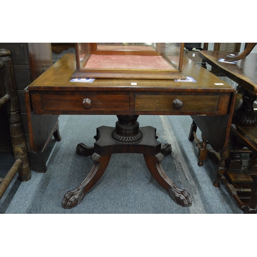 258 - A 19th century mahogany pedestal Pembroke table.