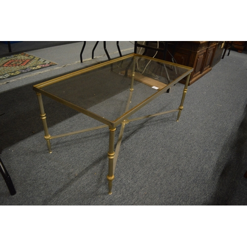 287 - A stylish glass top metal coffee table.