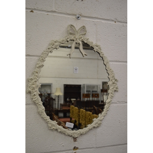 293 - A decorative wall mirror.