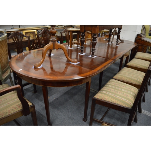 300 - A mahogany and satinwood banded extending dining table comprising drop-leaf central section, pair of... 