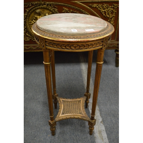 308 - A giltwood and marble top circular occasional table or jardiniere stand.