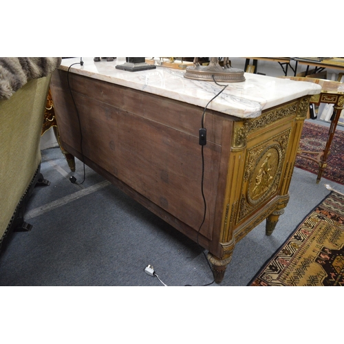 309 - A very good mahogany and ormolu mounted marble top commode of large size.