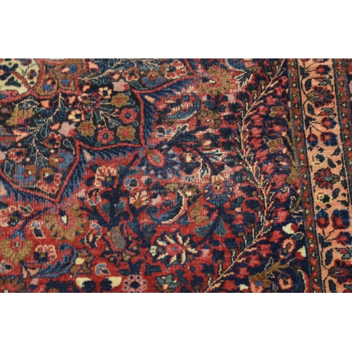 317 - A good Persian rug, 202cm x 139cm.