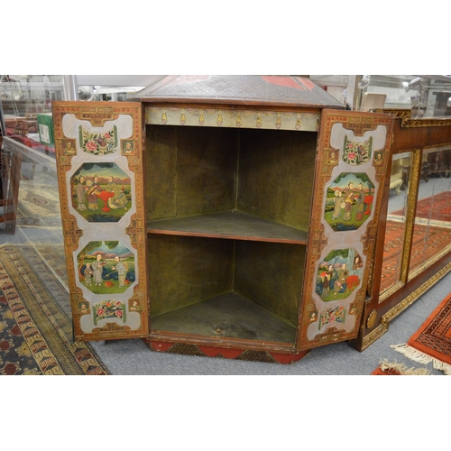 334 - An unusual chinoiserie and lacquer decorated hanging corner cupboard.