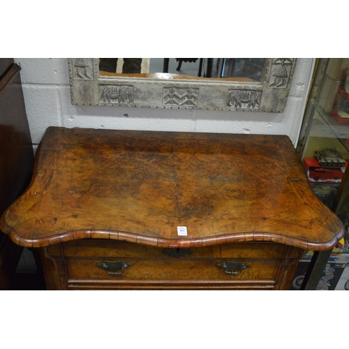 363 - A good 18th century Dutch walnut commode of bombay form with three drawers on bun feet.