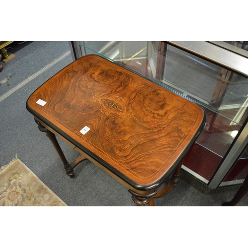 366 - A good Victorian figured walnut and marquetry inlaid work table.