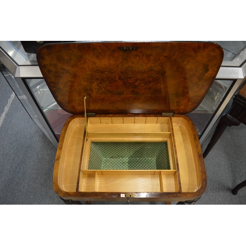 366 - A good Victorian figured walnut and marquetry inlaid work table.