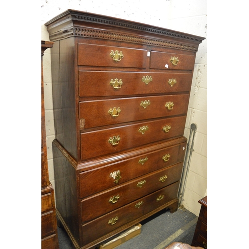 371 - A George III oak chest on chest.