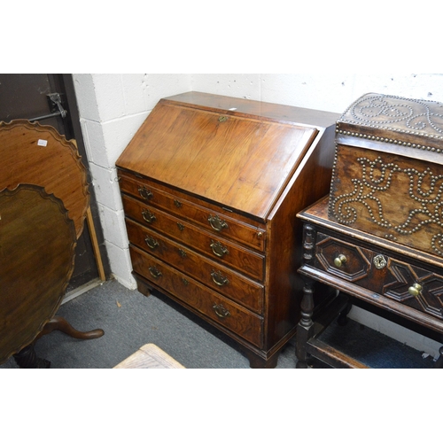 377 - An 18th century walnut bureau.