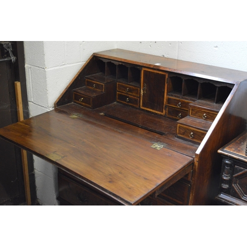 377 - An 18th century walnut bureau.