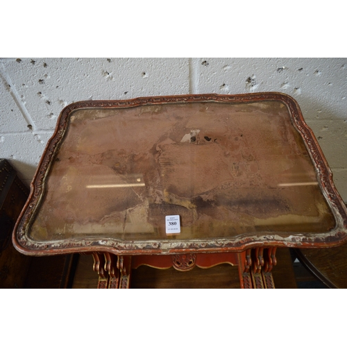 380 - An unusual nest of three Chinese cinnabar lacquer style tables with figural decoration.