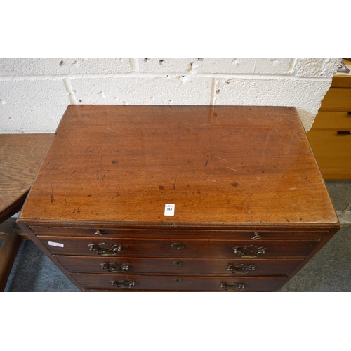 383 - A George III mahogany caddy top chest of drawers with brushing slide, four graduated long drawers on... 