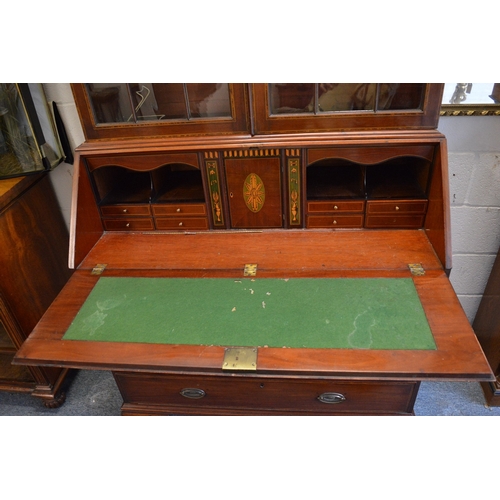 387 - A good George III design mahogany and inlaid bureau bookcase.