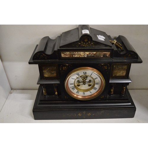 497 - A Victorian slate mantel clock.