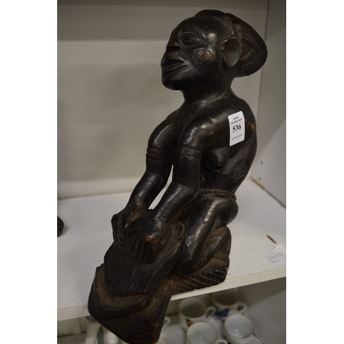 536 - An African carved wood figure.