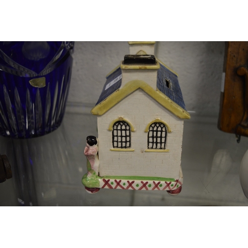 551 - A 19th century Staffordshire pottery house shaped money box, a Christening gift for Anne Smith, born... 