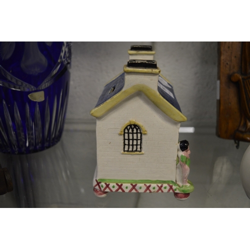 551 - A 19th century Staffordshire pottery house shaped money box, a Christening gift for Anne Smith, born... 