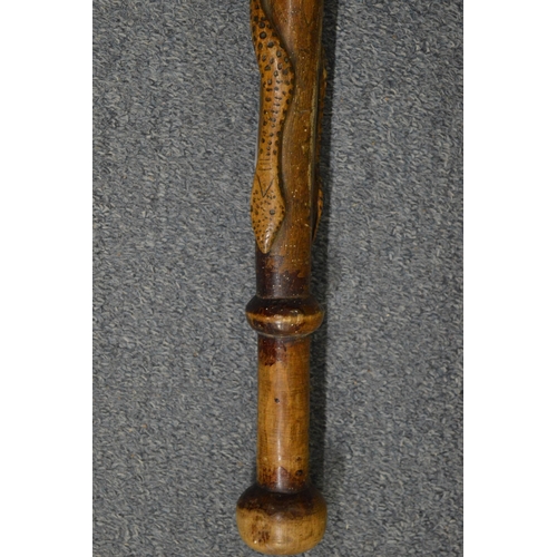 631 - Walking stick carved with entwined snakes.