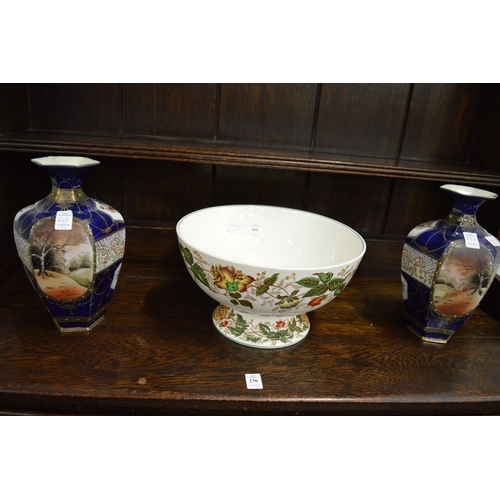 666 - A Wedgwood 'Surrey' pedestal bowl and a pair of vases.