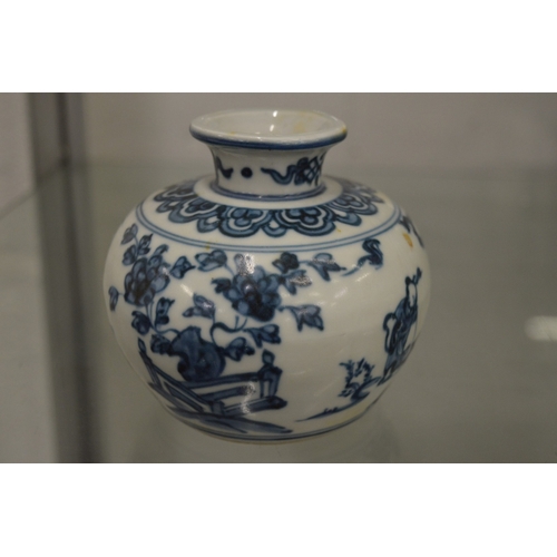 669 - A Chinese blue and white small squat shaped vase.