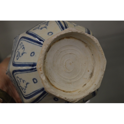 670 - A Chinese blue and white octagonal shaped baluster vase.