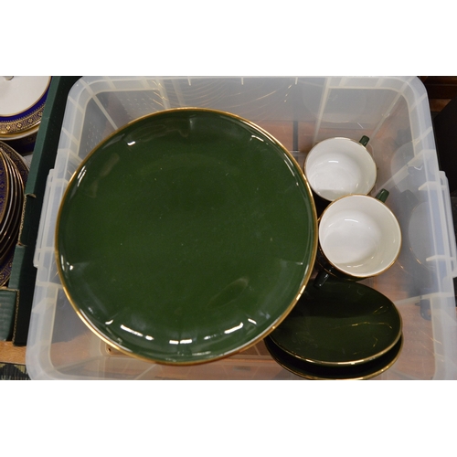 701 - A large quantity of Apilco green and gilt china.