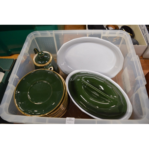 701 - A large quantity of Apilco green and gilt china.