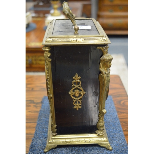 749 - A French ebonised and gilt metal mounted mantel clock by Japy Freres.