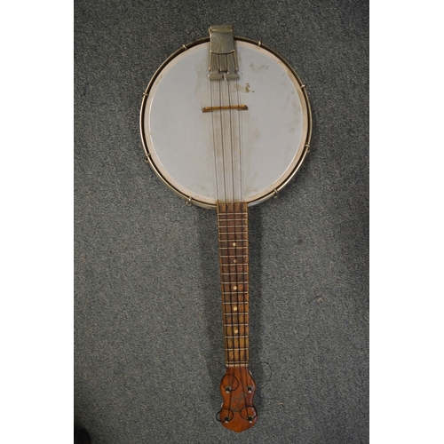 766 - A George Formby banjolele, with case.