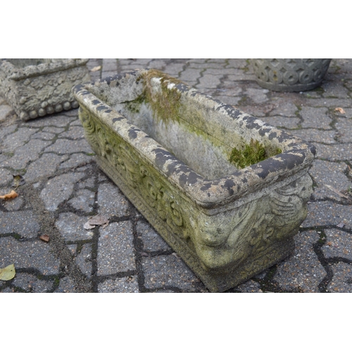 8 - A pair of reconstituted stone garden troughs and a similar trough.