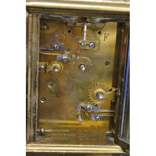 824 - Brass carriage clock.