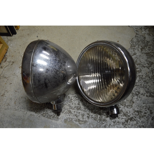 83 - A pair of old chrome car lamps.